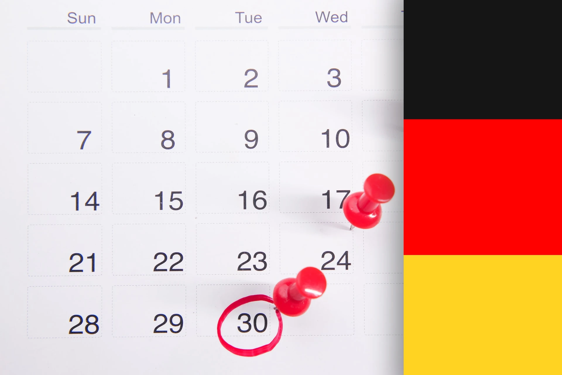 Kalendarz z oznaczeniem terminu aborcji a po prawej flaga Niemiec
